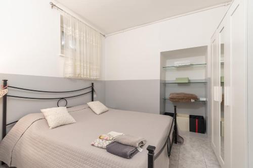 Postel nebo postele na pokoji v ubytování La CORTE di GIO' 1