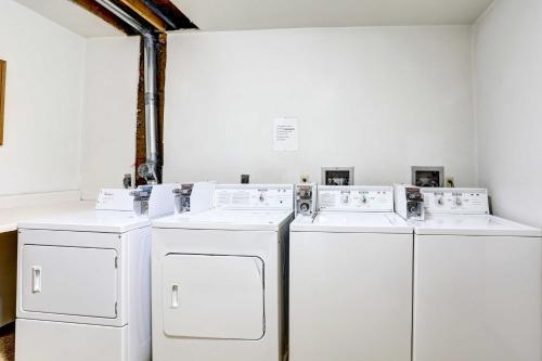 four whitewashes in a room with white walls at Pierre Vacation Rental - 9 Mi to Oahe Dam! in Pierre