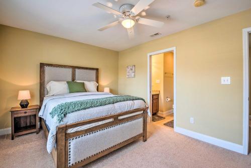 a bedroom with a bed and a ceiling fan at Smyrna Vacation Rental about 2 Mi to The Battery! in Smyrna