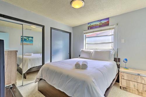 A bed or beds in a room at North Miami Beach Rental Near Walking Park!