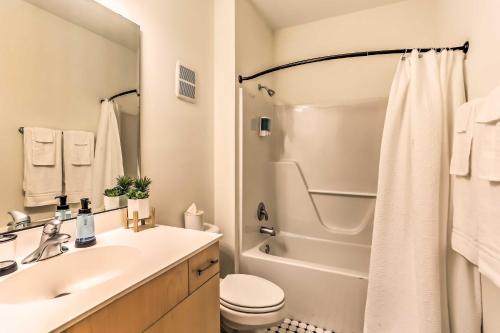 a bathroom with a sink and a toilet and a shower at Dwtn Condo 4 Blocks to The Wilmington Riverwalk! in Wilmington