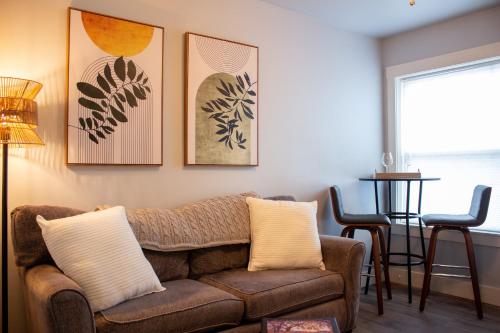 a living room with a couch and a table at Douglas On Third in McMinnville