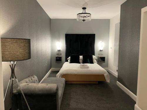 Tempat tidur dalam kamar di Royal Mile Apartment 2Bedroom