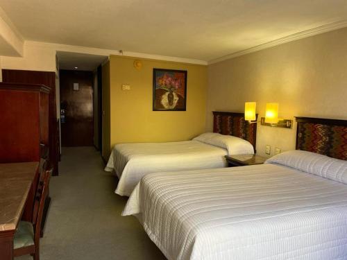 Katil atau katil-katil dalam bilik di Arroyo Express