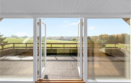 an open window with a view of a bridge at Lovely Home In Faaborg With Wifi in Fåborg