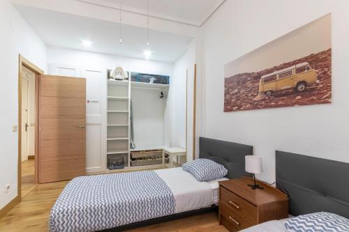 Postel nebo postele na pokoji v ubytování Apartamento junto al Guggenheim con parking gratuito