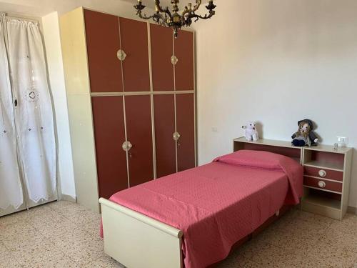 Appartamento a Pianello, dintorni di Assisi tesisinde bir odada yatak veya yataklar