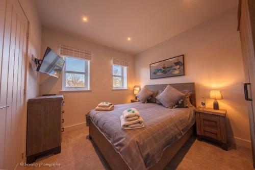 Ένα ή περισσότερα κρεβάτια σε δωμάτιο στο Molehill Cottage - New 2023 - EV Charger - Pets