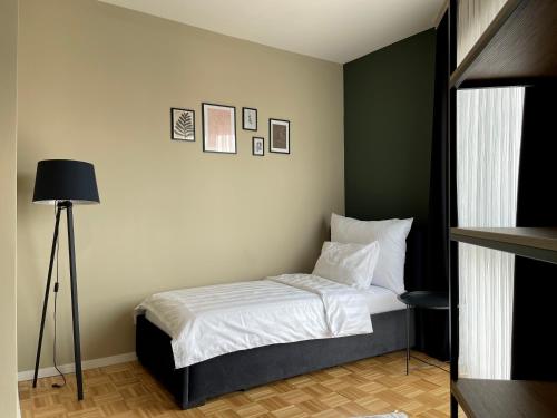 Postel nebo postele na pokoji v ubytování Premium Apartments