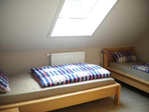 Giường trong phòng chung tại Ferienhof Knoll
