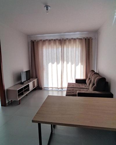 Apartamento Praia Taperapuan休息區