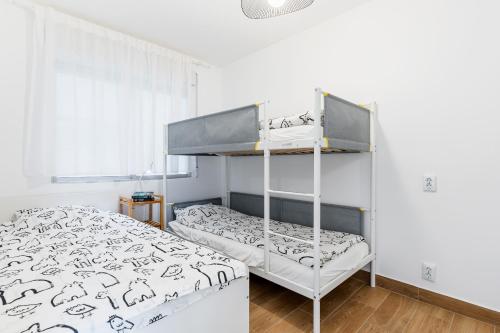 A bed or beds in a room at Apartamento Playa del Cura