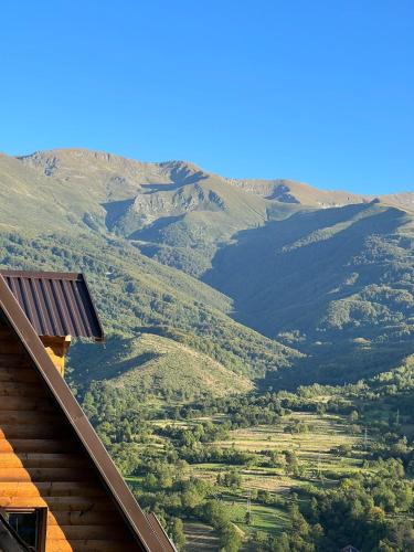 a view of a valley with mountains in the background at Vikendica Aview in Štrpce
