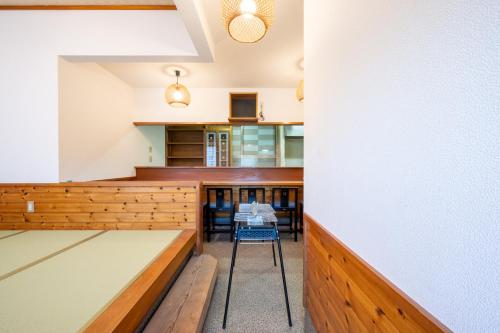 a dining room with a table and chairs at VILLENT KUJUKURI MARINE in Kujukuri