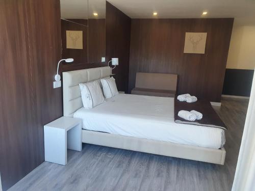 Letto o letti in una camera di DOBAU village