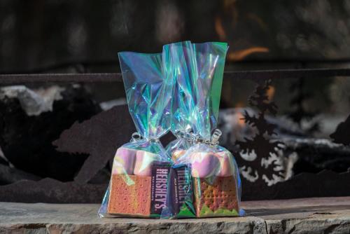 a group of candy in a bag on a table at Bear Creek Lodge by Alpine Lodging Telluride in Telluride