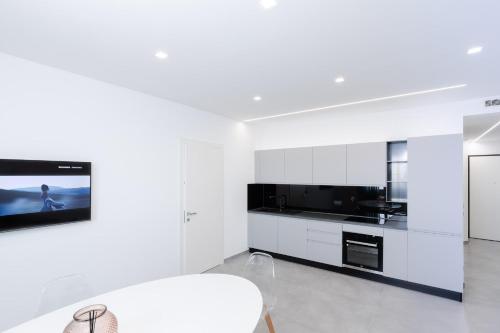 Η κουζίνα ή μικρή κουζίνα στο Villa la Matta Apartments and Luxury suites