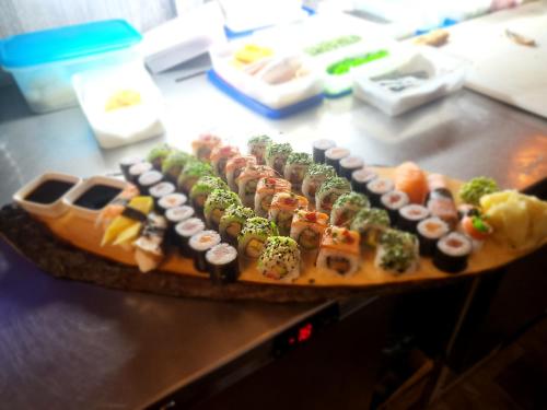 a plate of sushi on top of a table at Gasthaus Pavillon in Dresden