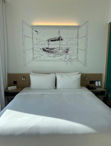 Postel nebo postele na pokoji v ubytování Nice Dubai