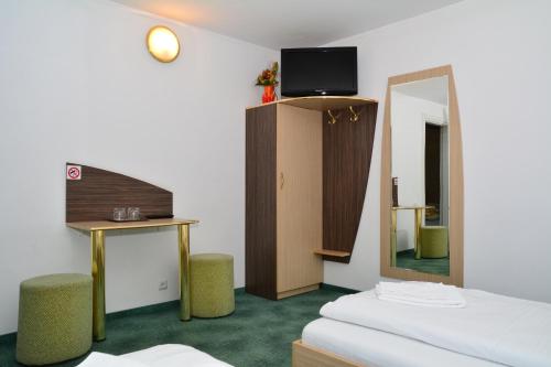 Postel nebo postele na pokoji v ubytování Pensiunea Verde
