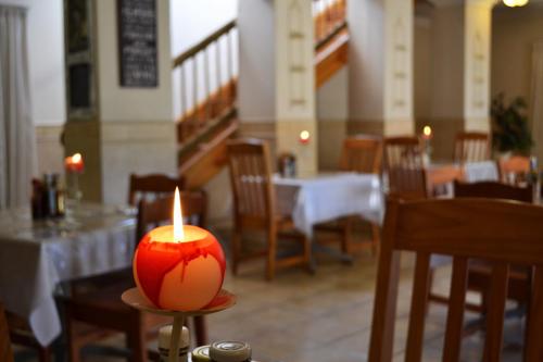 Restaurant ou autre lieu de restauration dans l'établissement Dove's Nest Guest House