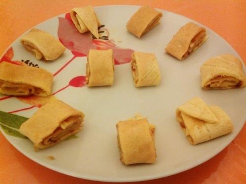 a white plate with a bunch of sandwiches on it at Agriturismo La Collina Verde in Levanto