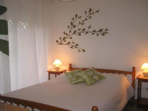 Posteľ alebo postele v izbe v ubytovaní Appartement F2 climatisé, balcon, proche Thermes d'Amélie-les-Bains - FR-1-703-21
