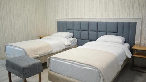 Cama o camas de una habitación en 21 Rooms Hotel