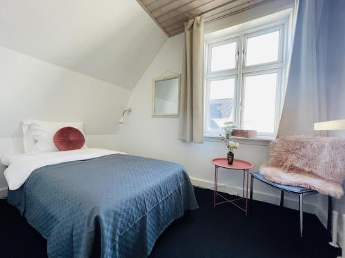 Postel nebo postele na pokoji v ubytování aday - Spacious and beautiful apartment in the center of Frederikshavn
