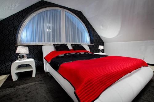 
Łóżko lub łóżka w pokoju w obiekcie Hotel Millenium
