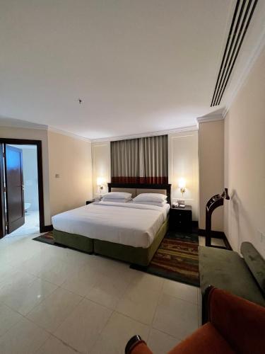 Letto o letti in una camera di City Seasons Suites