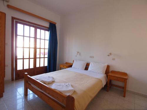 Cama o camas de una habitación en Irini Apartments