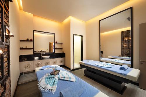 Ένα ή περισσότερα κρεβάτια σε δωμάτιο στο The Time Hotel Marina
