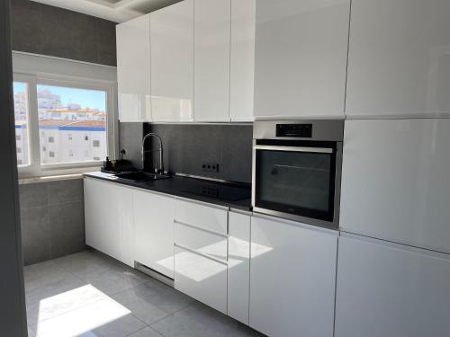 Apartment with a city and ocean view