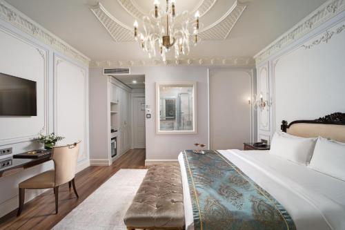 Ένα ή περισσότερα κρεβάτια σε δωμάτιο στο The Time Hotel Marina