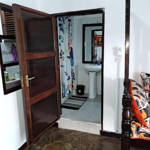 Koupelna v ubytování Cosy apartment in Malindi beach