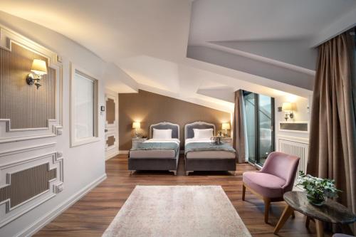 Ένα ή περισσότερα κρεβάτια σε δωμάτιο στο The Time Hotel Marina