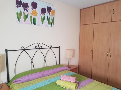 Postel nebo postele na pokoji v ubytování Apartamentos el Sauco