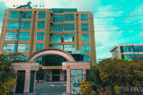 a building with an arch in front of it at Greenlight Hotel in Dar es Salaam