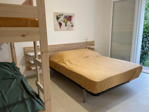 Posteľ alebo postele v izbe v ubytovaní 2 chambres et jardin à Bormes - Le Lavandou