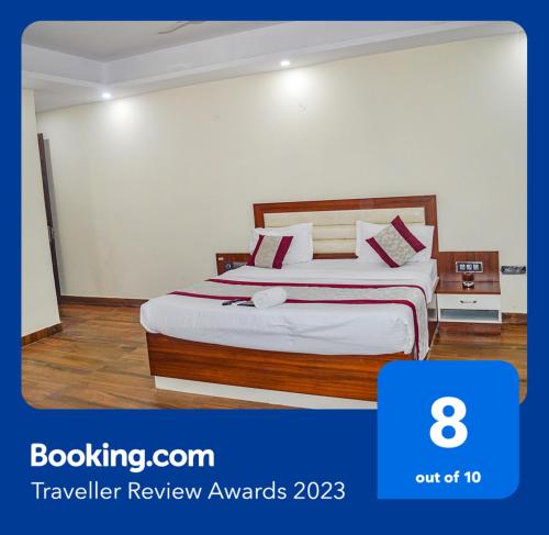 Ένα ή περισσότερα κρεβάτια σε δωμάτιο στο FabHotel The Golf Inn