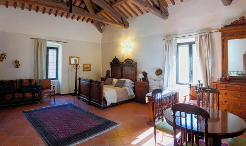 Postel nebo postele na pokoji v ubytování ABBAZIA SS. QUIRICO E GIULITTA