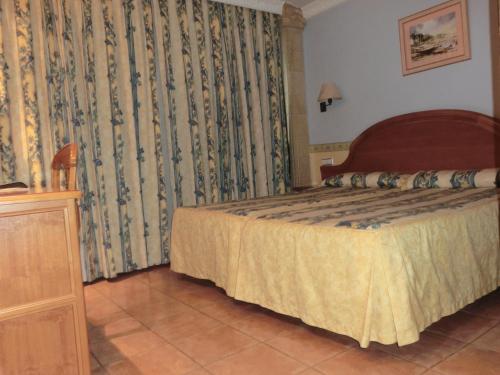 Hotel Las Ruedasにあるベッド