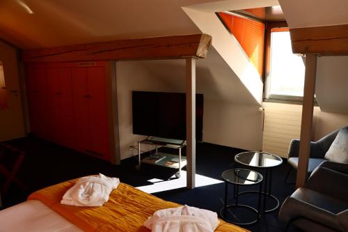 La Clef D'Or Auberge Communaleにあるテレビまたはエンターテインメントセンター