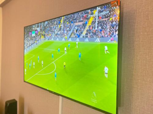 TV a/nebo společenská místnost v ubytování Cream Loft
