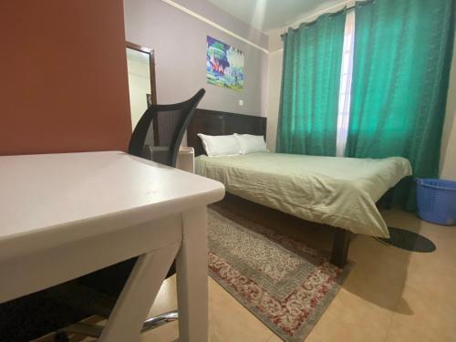 Postel nebo postele na pokoji v ubytování Cream Loft