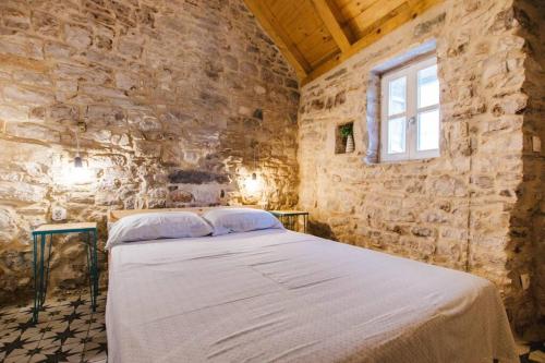 Postel nebo postele na pokoji v ubytování Mala House - Šolta Island