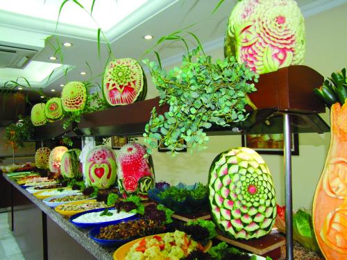 a display of colorful vases on a table at STELLA HOTEL&Spa ALL INCLUSIVE in Kemer