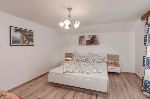 Ένα ή περισσότερα κρεβάτια σε δωμάτιο στο Ferienhaus Oberried