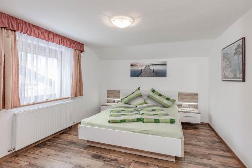 Katil atau katil-katil dalam bilik di Ferienhaus Oberried